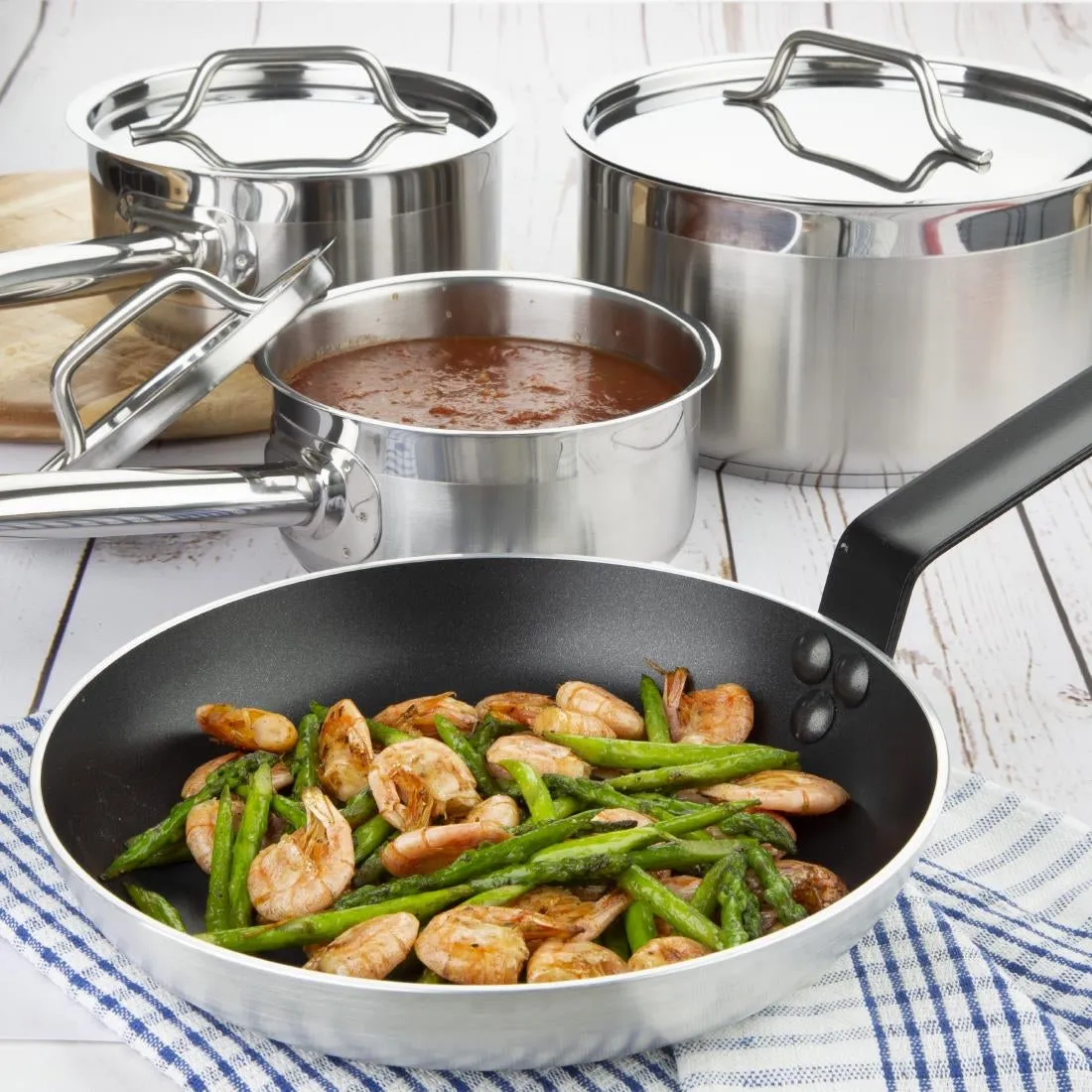 SA689 Nisbets Essentials Cook Like A Pro 4-Piece Saucepan and Frying Pan Set